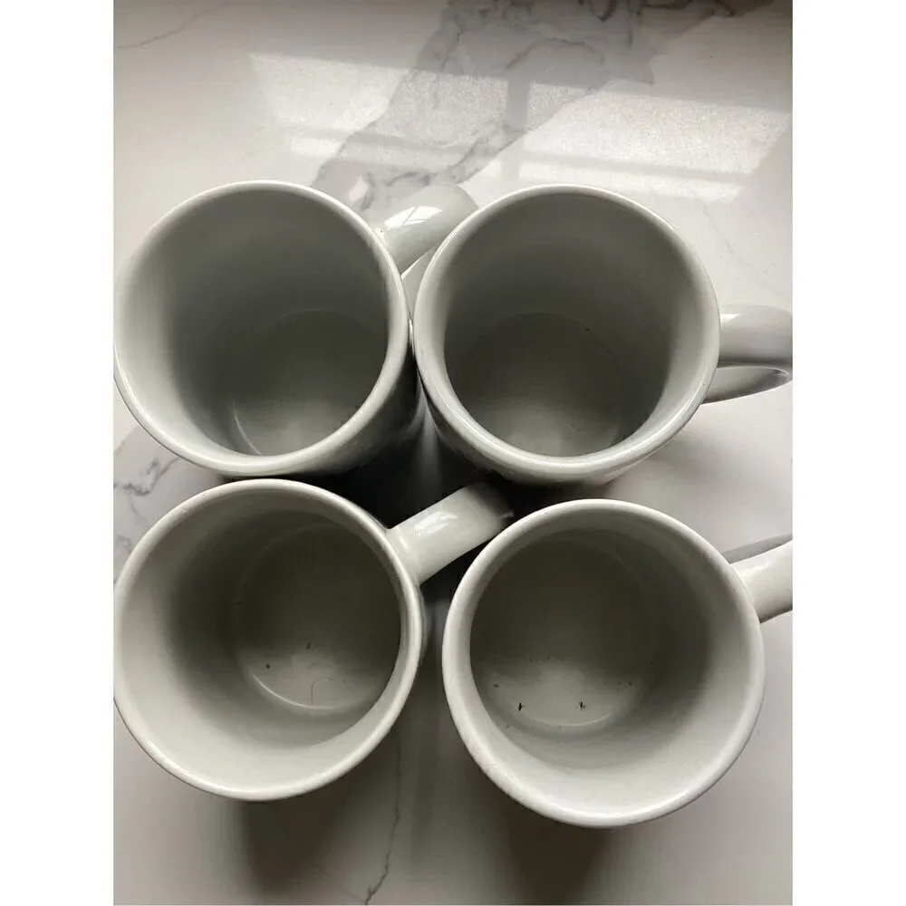 Set of 4 Crate & Barrel 12oz Ceramic Coffee Mugs Joan Anderson Skating Reindeer